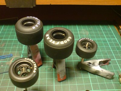 Wheels are finished - simple work with X18 &amp; some brown women make-up finished with flat clear. Tyre markings are DecalPool decals -no transfer decals. I have a Fujimi PE stencil for BT46B but is way too big for Tamiya tyres, so... Fingers crossed not see them pulling away in a few years