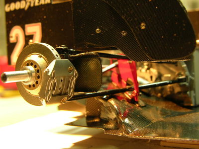 A view to the rear end with the enlarged body cowling between the upper and lower arms (scratch buildt)