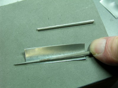To form the alu I used a conic needle file