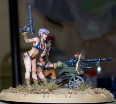 1/48 Mercenary &quot;Sisters of Mayhem&quot; fire support team from &quot;Dust 1947&quot;. The woman in the bikini is a conversion.