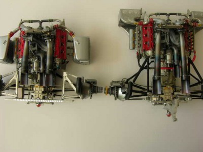 Note the different rear suspensions of the two versions