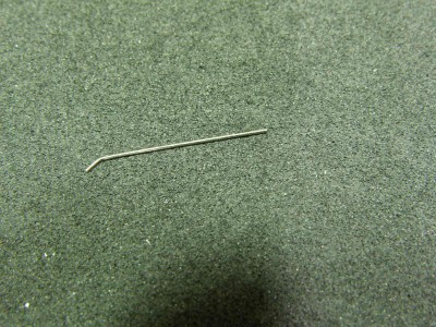 I bend the end of the wire for about 2 mm for an easier insertion.