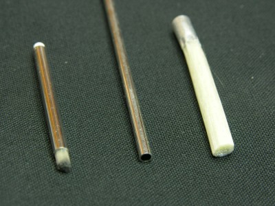 Finished tool (left) metal tube (centre) fiber glass erazor (right)